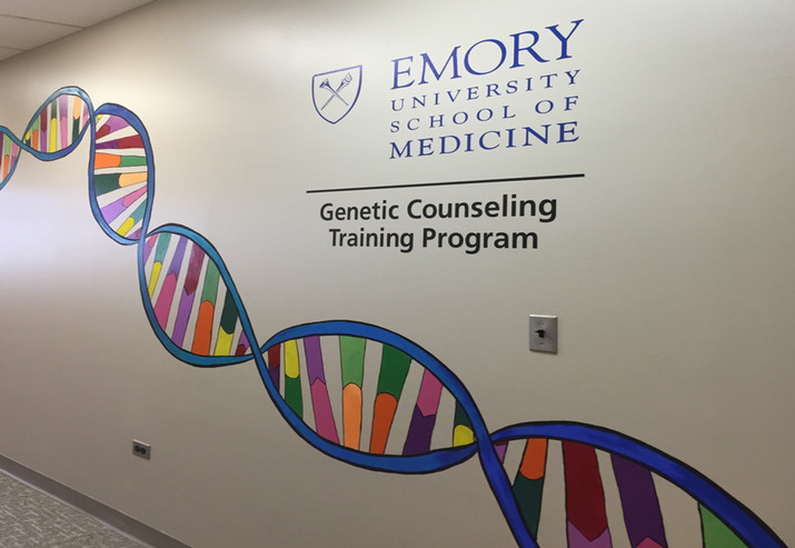 hallway in the school of medicine with the Genetic Counseling Training Program painted on the wall