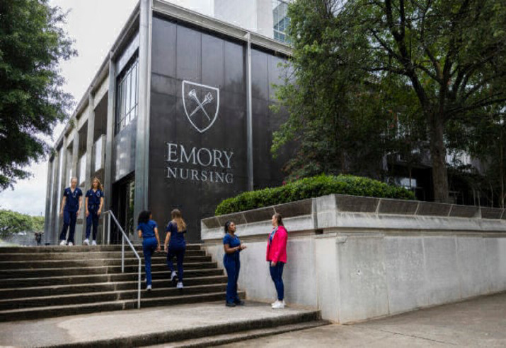 students outside of Emory's School of Nursing entrance